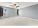 Spacious bedroom with neutral walls, ceiling fan, and large windows at 2062 Club Crest Way, Henderson, NV 89014