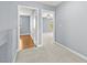 Hallway with carpet and doors leading to bedrooms at 2062 Club Crest Way, Henderson, NV 89014