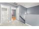 Hallway with neutral carpet and access to bathroom and bedroom at 2062 Club Crest Way, Henderson, NV 89014