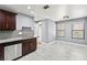 Well-lit kitchen area features granite countertops and stainless steel dishwasher at 2062 Club Crest Way, Henderson, NV 89014