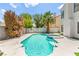 Refreshing pool and spa with well-maintained landscaping in a private backyard setting at 2062 Club Crest Way, Henderson, NV 89014