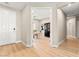 Inviting entryway features light wood floors and a glimpse into a stylishly decorated office space at 2227 Garden City Ave, Henderson, NV 89052
