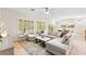 Open-concept living room boasts neutral tones, comfortable seating, and seamless flow to dining area at 2227 Garden City Ave, Henderson, NV 89052