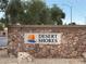 Desert Shores community entrance sign with stone detail and a sailboat logo at 3157 Capetown Way, Las Vegas, NV 89128