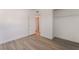 This bedroom features modern flooring, a spacious closet, and a doorway at 3200 E Owens Ave, North Las Vegas, NV 89030
