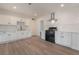 Spacious kitchen with stainless steel appliances and white cabinetry at 3200 E Owens Ave, North Las Vegas, NV 89030