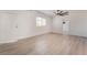 Bright living room featuring a modern ceiling fan, and a window at 3200 E Owens Ave, North Las Vegas, NV 89030