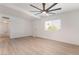 Bright living room featuring a modern ceiling fan, and a window at 3200 E Owens Ave, North Las Vegas, NV 89030
