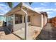 Back patio with access to a screened-in porch at 3200 E Owens Ave, North Las Vegas, NV 89030