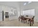 Bright dining area adjacent to the kitchen, perfect for Gathering meals and entertaining guests at 3205 Rainmaker St, Las Vegas, NV 89129