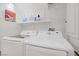 The laundry room features a side-by-side Samsung washer and dryer with a white utility sink at 3205 Rainmaker St, Las Vegas, NV 89129