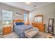 Comfortable bedroom with carpet, wood furniture, and soft lighting at 326 Beethoven Ridge Dr, Henderson, NV 89011