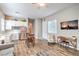 Inviting living area with wood floors, stainless steel appliances, and neutral color palette at 326 Beethoven Ridge Dr, Henderson, NV 89011
