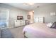 Main bedroom features a plush bed, television, and private balcony access at 326 Beethoven Ridge Dr, Henderson, NV 89011