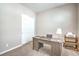 Home office space with desk, natural light, and a clean, modern design at 326 Beethoven Ridge Dr, Henderson, NV 89011