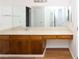 Bathroom vanity features a long mirror and light-colored countertop at 3811 Desert Marina Dr # 125, Laughlin, NV 89029