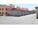 Long row of private detached garages for residents, offering convenient parking and extra storage at 3811 Desert Marina Dr # 125, Laughlin, NV 89029