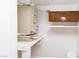 Utility space with shelving, storage cabinet and equipment at 3811 Desert Marina Dr # 125, Laughlin, NV 89029