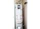 Standard water heater with connections and safety features present at 3811 Desert Marina Dr # 125, Laughlin, NV 89029