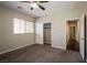 Bedroom with a closet, neutral paint, carpet, and window with blinds at 3820 Alpine Track Ave, North Las Vegas, NV 89032