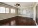 Spacious living room features hardwood floors, built-in shelving, and plenty of natural light at 3820 Alpine Track Ave, North Las Vegas, NV 89032