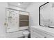 Bathroom features a shower, toilet, and vanity sink, offering essential amenities in a clean and functional space at 3923 Gogo Way # 106, Las Vegas, NV 89103