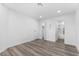 Spacious bedroom with modern flooring provides access to a bathroom and closet for added convenience at 3923 Gogo Way # 106, Las Vegas, NV 89103