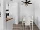 Bright dining area with modern furnishings and a ceiling fan at 3923 Gogo Way # 106, Las Vegas, NV 89103