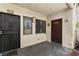 Front entrance featuring iron security gate and an iron bars on the window at 3923 Gogo Way # 106, Las Vegas, NV 89103