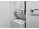 Convenient laundry area features a stackable washer and dryer unit, maximizing space efficiency at 3923 Gogo Way # 106, Las Vegas, NV 89103