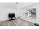 Bright living room showcasing modern flooring, neutral tones, and natural lighting at 3923 Gogo Way # 106, Las Vegas, NV 89103