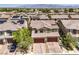 Aerial view of homes, showing tile roofs, well-kept landscaping, and mountain backdrop at 4212 Juanita May Ave, North Las Vegas, NV 89032