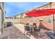 Inviting backyard features a brick-paved patio area perfect for outdoor dining and relaxation at 4212 Juanita May Ave, North Las Vegas, NV 89032