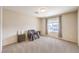 Spacious bedroom with plush carpet and cozy reading nook at 4212 Juanita May Ave, North Las Vegas, NV 89032