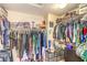 Walk-in closet with ample storage and clothing racks at 4212 Juanita May Ave, North Las Vegas, NV 89032