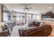 Comfortable living room with a ceiling fan and patio access at 4212 Juanita May Ave, North Las Vegas, NV 89032
