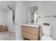 Updated bathroom features modern vanity and shower with rainfall showerhead and subway tile at 4330 Flandes St, Las Vegas, NV 89121