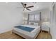Bright bedroom featuring a large window, ceiling fan, and hardwood floors at 4330 Flandes St, Las Vegas, NV 89121