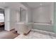 Modern bathroom with double vanity, large soaking tub, and marble flooring at 4575 Dean Martin Dr # 2607, Las Vegas, NV 89103