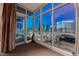 A bright living room featuring floor to ceiling windows with an unobstructed city view at 4575 Dean Martin Dr # 2607, Las Vegas, NV 89103