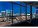 The panoramic city view shines brightly through expansive windows from this homes interior at 4575 Dean Martin Dr # 2607, Las Vegas, NV 89103