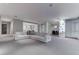 Spacious open-concept living room with neutral color palette leading to the dining and kitchen areas at 4575 Dean Martin Dr # 2607, Las Vegas, NV 89103
