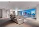 Bright, spacious living room featuring neutral tones and stunning city views at 4575 Dean Martin Dr # 2607, Las Vegas, NV 89103