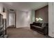 Comfortable living room with a brown sofa and stylish, modern decor elements at 4575 Dean Martin Dr # 2607, Las Vegas, NV 89103