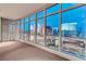 Spacious living room with floor-to-ceiling windows and stunning city views at 4575 Dean Martin Dr # 2607, Las Vegas, NV 89103