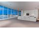 Bright and spacious living room featuring floor-to-ceiling windows, modern furniture, and stunning city views at 4575 Dean Martin Dr # 2607, Las Vegas, NV 89103