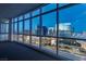 Spacious living room featuring floor-to-ceiling windows with panoramic city views and natural light at 4575 Dean Martin Dr # 2607, Las Vegas, NV 89103