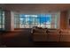 Cozy living room featuring comfortable sofa seating and floor-to-ceiling windows overlooking the city at 4575 Dean Martin Dr # 2607, Las Vegas, NV 89103