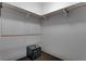 Walk-in closet featuring white walls, wood hangers, and a floor safe at 4575 Dean Martin Dr # 2607, Las Vegas, NV 89103