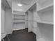 Bright, well-organized walk-in closet with shelving and hanging rods for ample storage space at 4575 Dean Martin Dr # 2607, Las Vegas, NV 89103